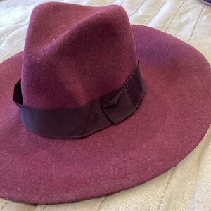 Brixton women’s full brim burgundy hat.
